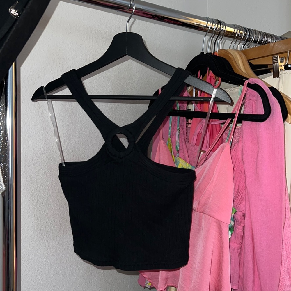 Black going out top